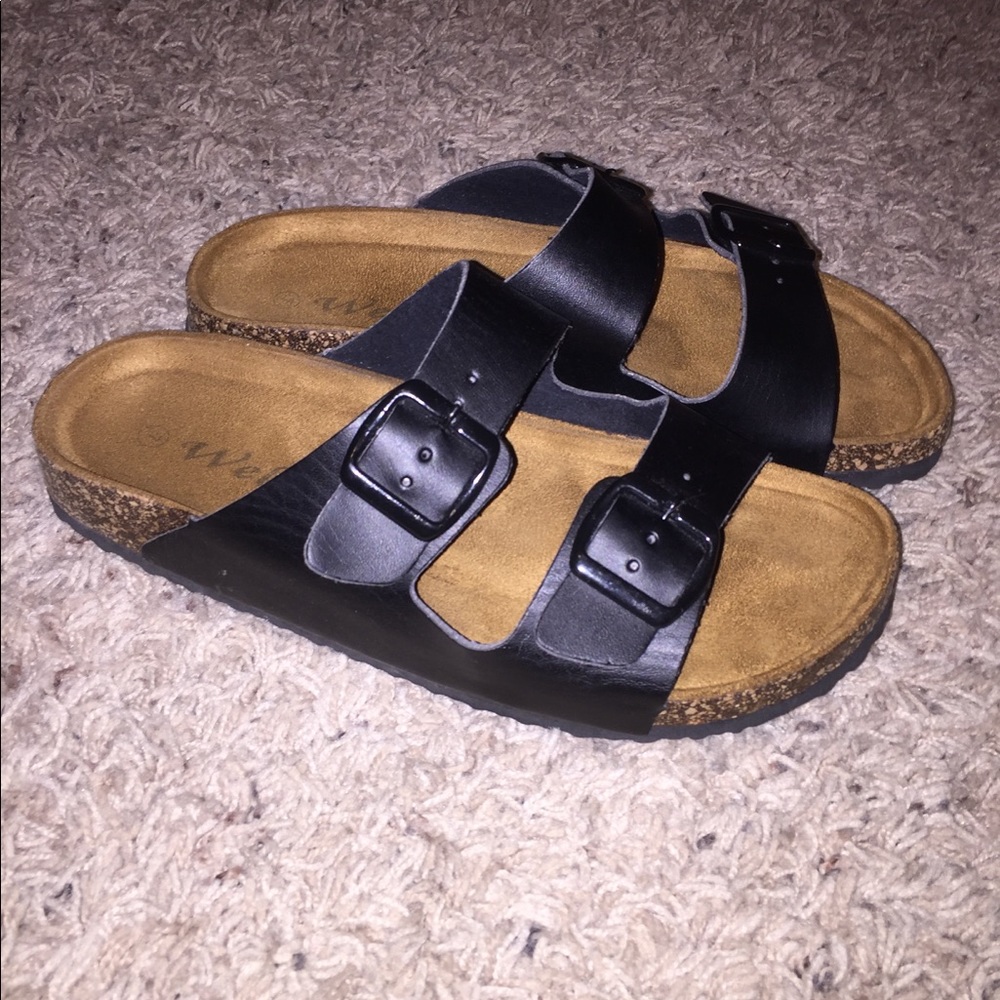 Women’s black buckle slides